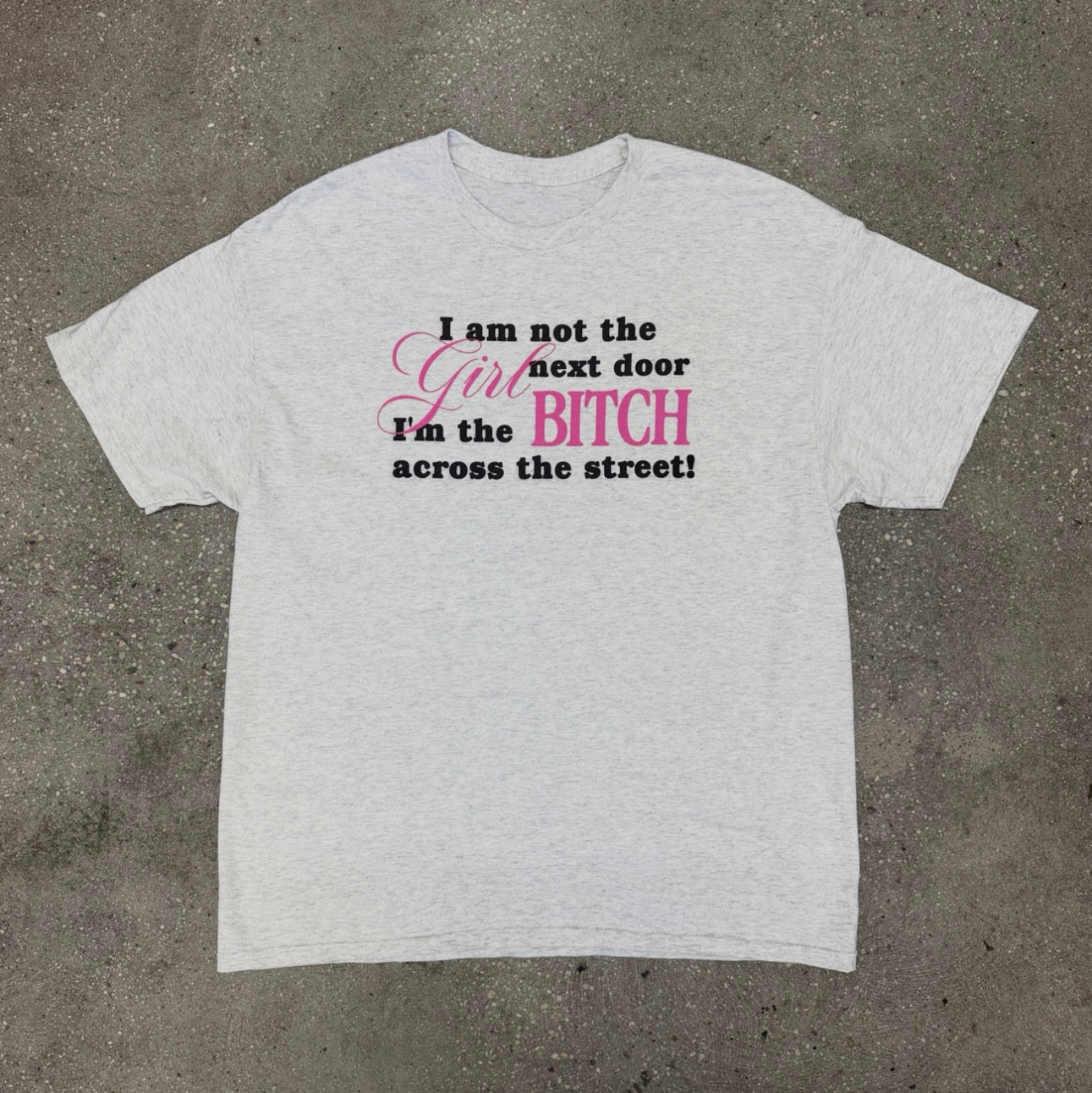 I am not the girl next door, I'm the bitch across the street! 100% Cotton Tee